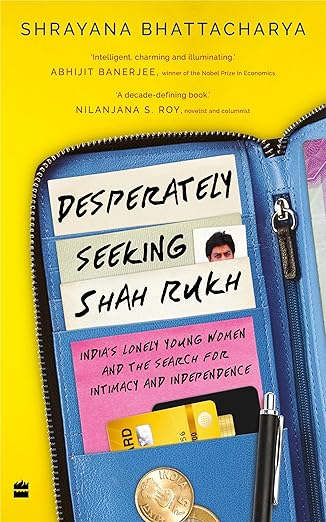 Book cover of 'Desperately Seeking Shah Rukh' by Shrayana Bhattacharya with a yellow background and blue zipper design. Bookish Wonderland serves readers throughout Bangladesh with books for study and leisure, making it simple to buy online through Cash on Delivery across Bangladesh and high-quality stitched and glue binding.