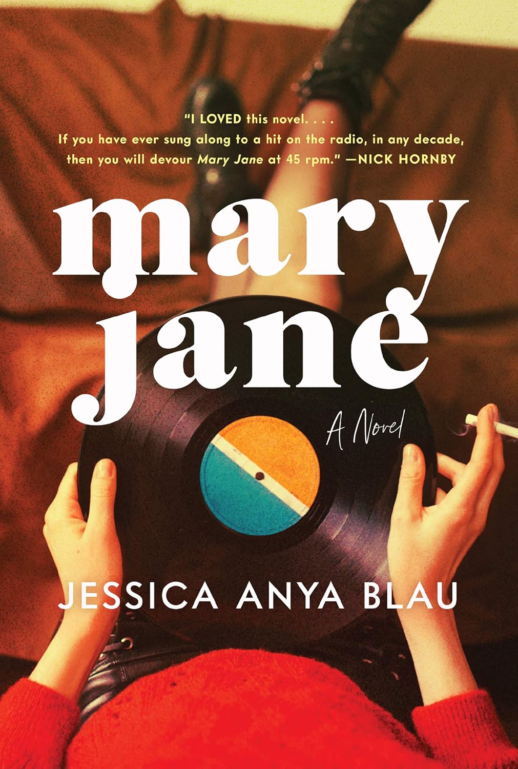 Book cover of 'Mary Jane' by Jessica Anya Blau with a vinyl record and hands holding it. Book buyers throughout Bangladesh can buy durable printed books from Bookish Wonderland, combining customer-friendly ordering and delivery with premium eye-soothing cream paper.