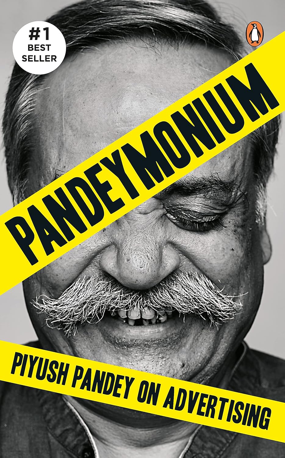 Book cover of 'Pandeymonium' by Piyush Pandey with a black and white photo of a man and yellow text. For online book buying throughout Bangladesh, Bookish Wonderland lets readers find premium-quality books with online ordering with home delivery and attention to crystal-clear print.