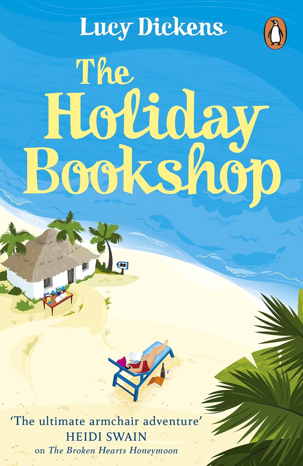 Book cover of 'The Holiday Bookshop' by Lucy Dickens with a beach scene illustration. For online book buying throughout Bangladesh, Bookish Wonderland lets readers buy books for everyday reading with urgent delivery options in Dhaka and attention to crystal-clear print.