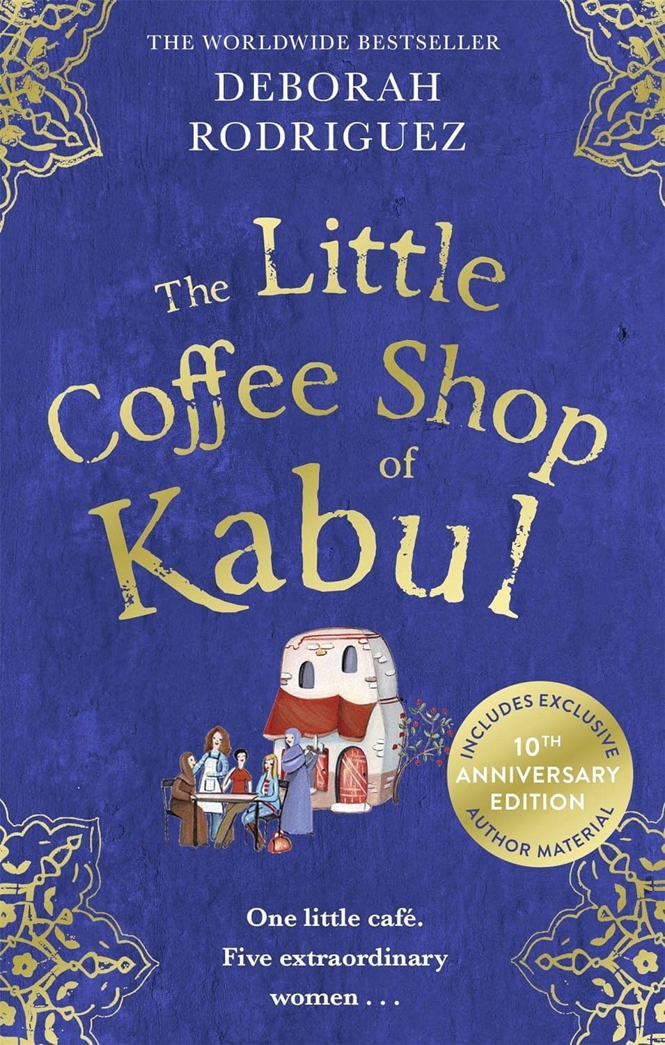 Book cover of 'The Little Coffee Shop of Kabul' by Deborah Rodriguez with a blue background and coffee shop illustration.Bookish Wonderland supports book lovers across Bangladesh who want to choose English books, offering customer-friendly ordering and delivery plus reader-friendly cream paper.