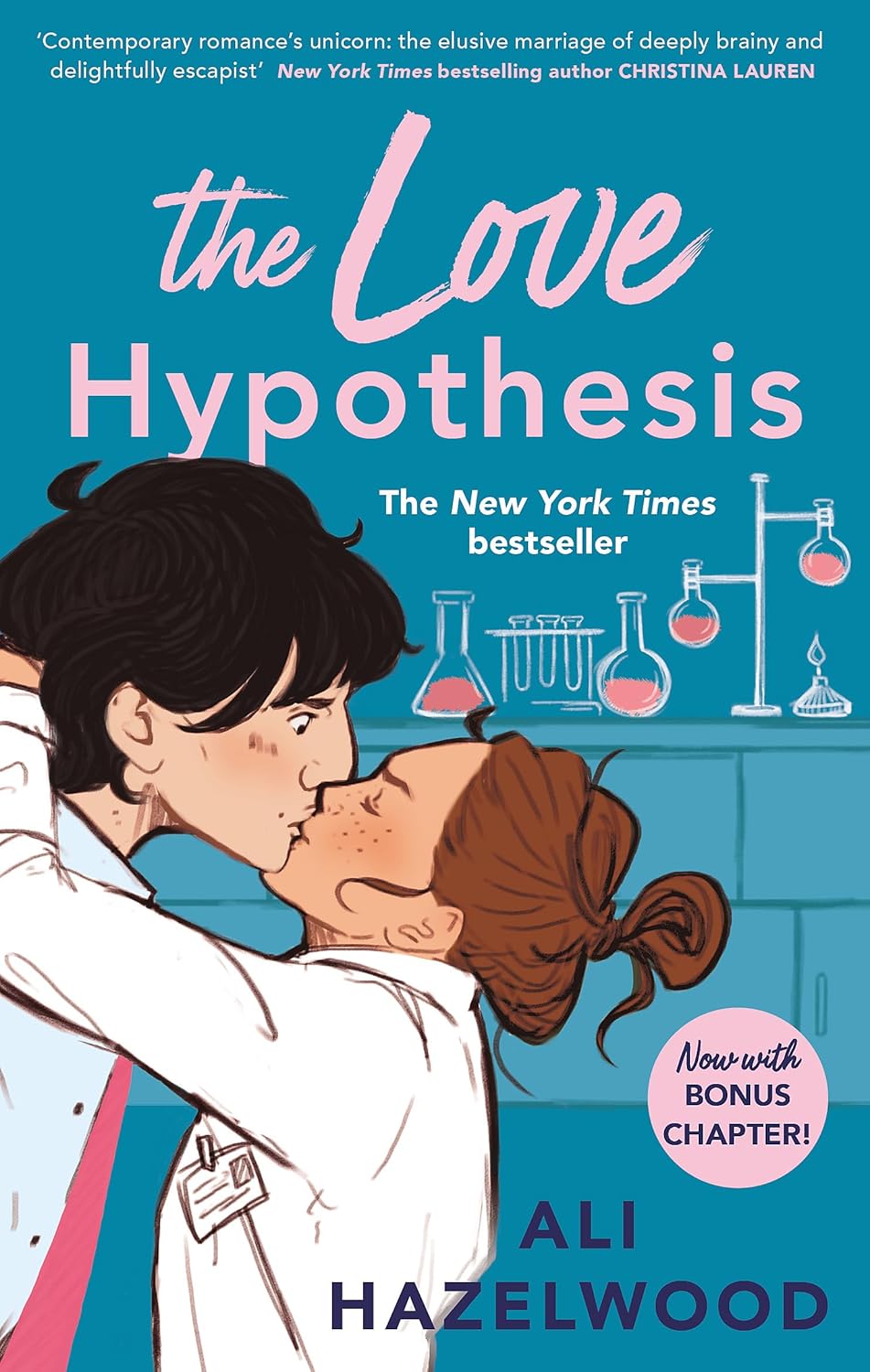 Book cover of 'The Love Hypothesis' by Ali Hazelwood with a couple embracing in a lab. Customers seeking books for study and leisure across Bangladesh can purchase them through Bookish Wonderland, supported by nationwide delivery and crystal-clear print.