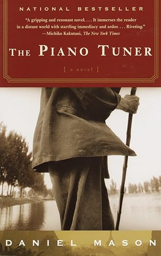 Book cover of 'The Piano Tuner' by Daniel Mason with a person holding a stick in a misty landscape.Bookish Wonderland helps readers across Bangladesh order reader-friendly printed books online with online ordering with home delivery and a focus on reader-friendly cream paper.