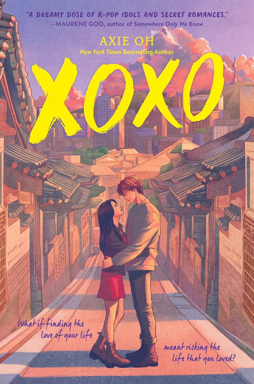 Front cover of the YA romance novel "XOXO" by Axie Oh, featuring an illustrated young couple embracing on a traditional Seoul street under a sunset sky, with the title written in large yellow brushstrokes. Bookish Wonderland focuses on customer satisfaction in Bangladesh.