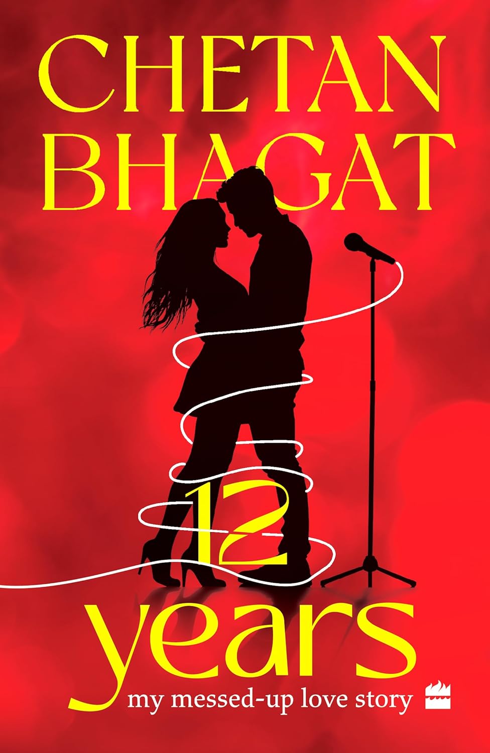 Book cover of '12 Years: My Messed-Up Love Story' by Chetan Bhagat with a silhouette of a couple and microphone on a red background.