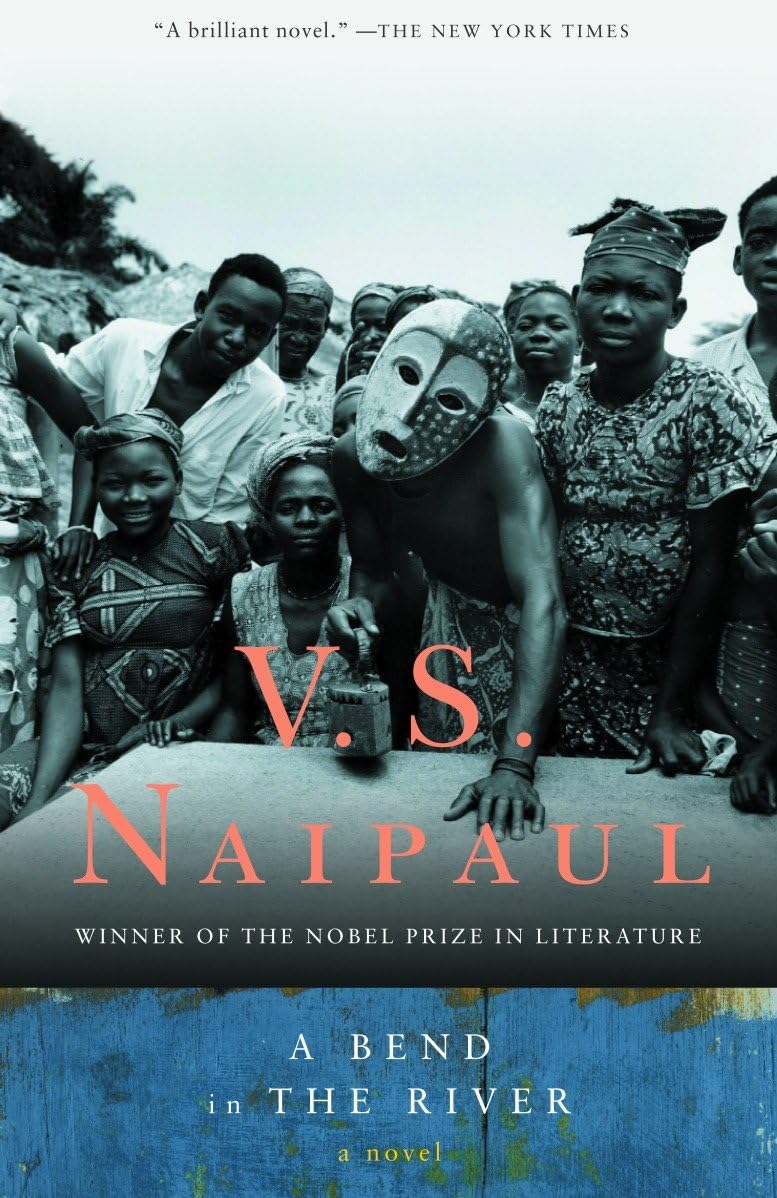 Book cover of 'A Bend in the River' by V.S. Naipaul featuring a group of people with a mask. Bookish Wonderland provides Cash on Delivery across Bangladesh.