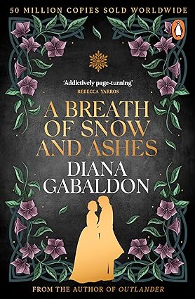 Book cover of 'A Breath of Snow and Ashes' by Diana Gabaldon with decorative elements and silhouette of a couple.