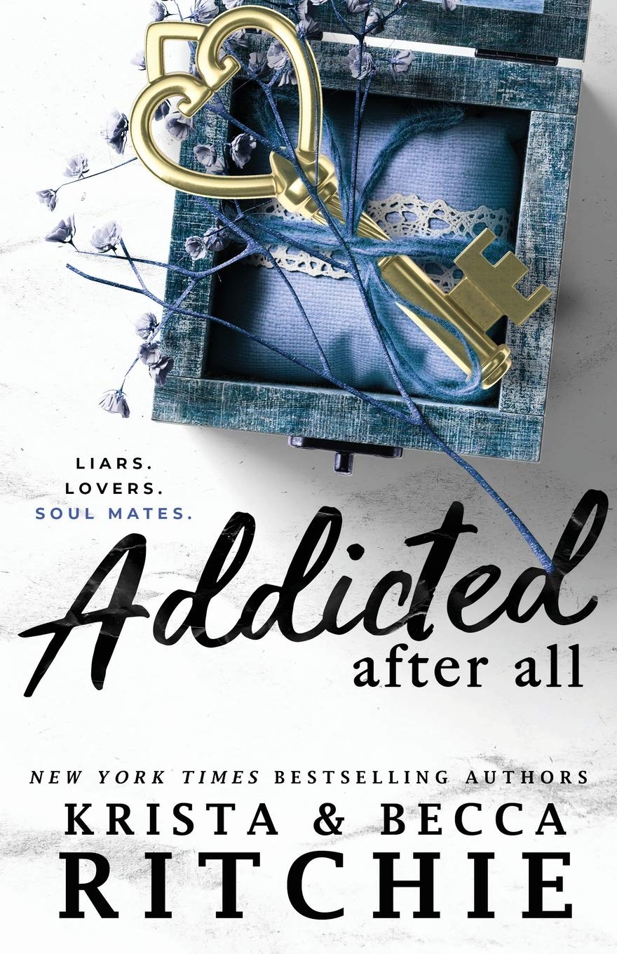 Addicted After All by Krista and Becca Ritchie (Addicted Series, Book 8) book cover featuring a gold heart-shaped key resting on a blue keepsake box with dried flowers. Contemporary romance novel by New York Times bestselling authors Krista & Becca Ritchie.
