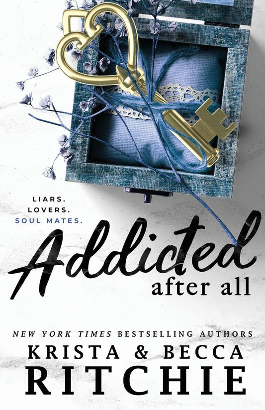 Addicted After All by Krista and Becca Ritchie (Addicted Series, Book 8) book cover featuring a gold heart-shaped key resting on a blue keepsake box with dried flowers. Contemporary romance novel by New York Times bestselling authors Krista & Becca Ritchie.