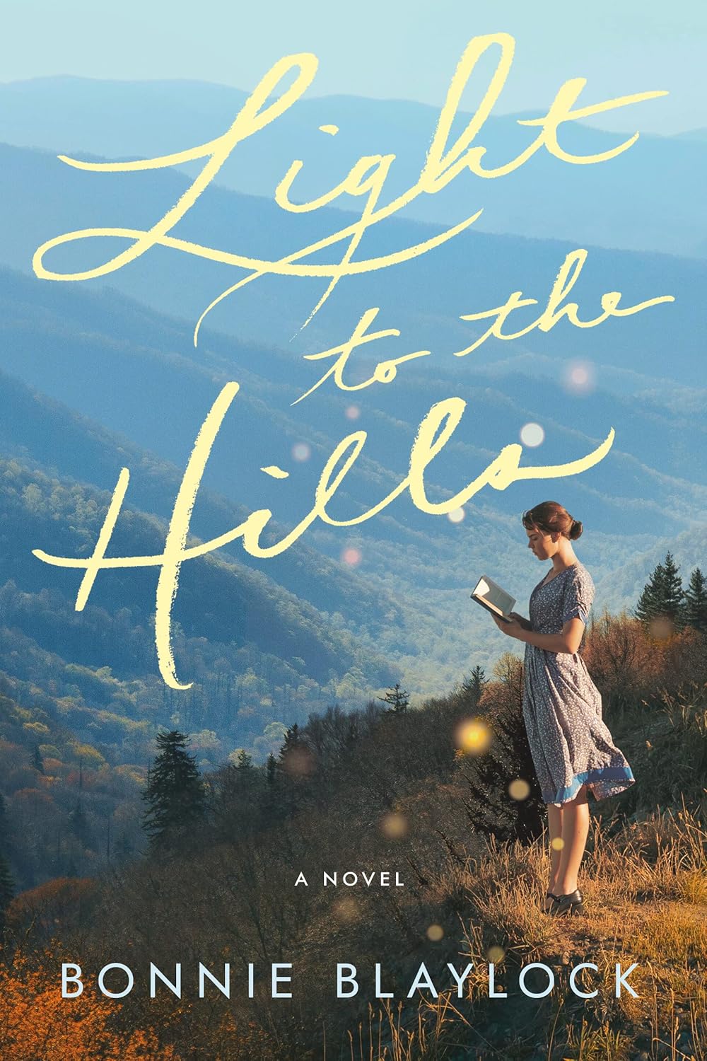 Book cover of 'Light to the Hills' by Bonnie Blaylock with a woman reading a book in a mountainous landscape. Book buyers across Bangladesh can get books for everyday reading from Bookish Wonderland, combining convenient delivery across Bangladesh with clear print with strong binding.