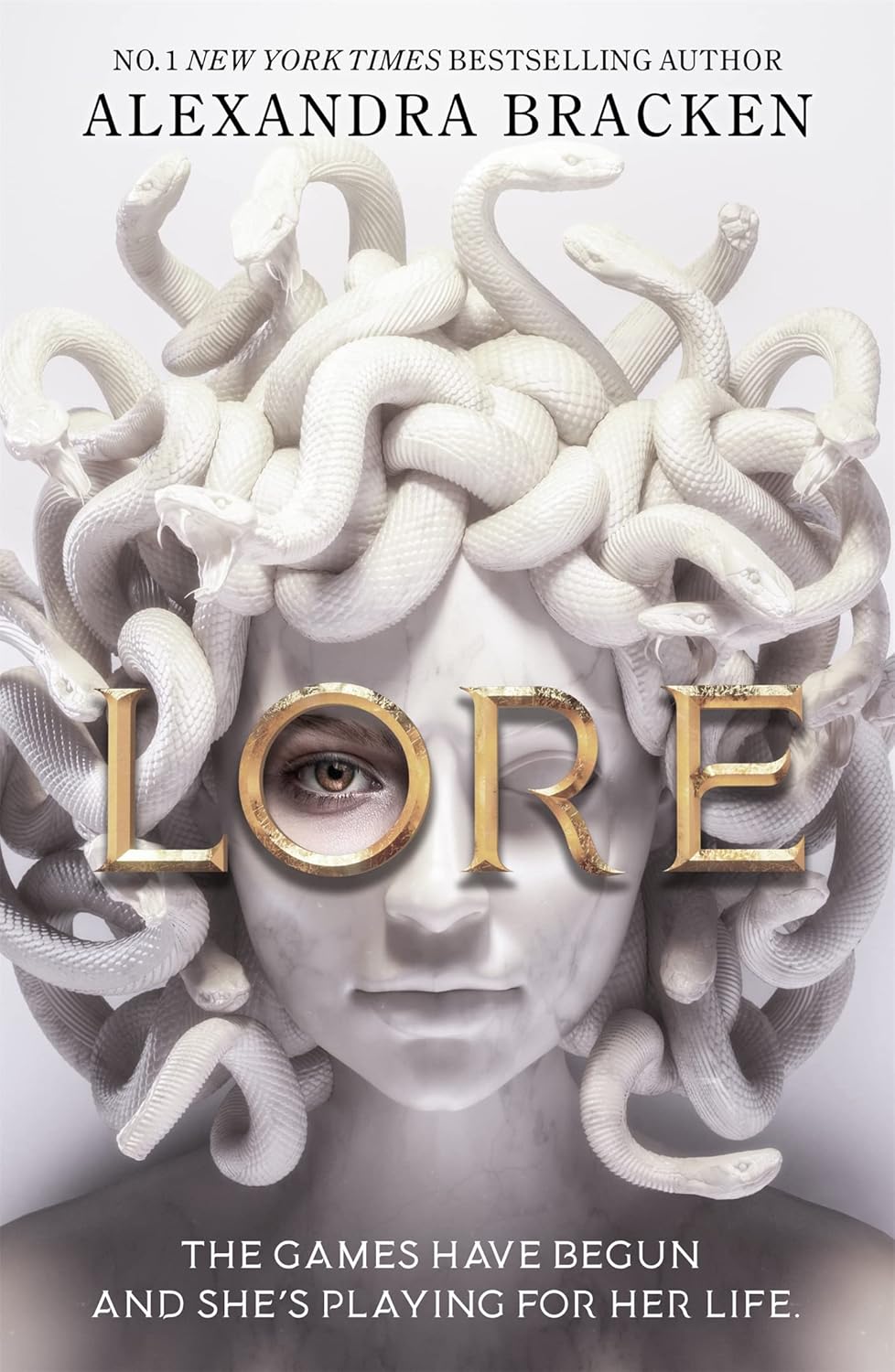 Book cover of 'Lore' by Alexandra Bracken featuring a woman with snakes in her hair. Readers across Bangladesh can buy books for study and leisure from Bookish Wonderland with delivery inside and outside Dhaka, while enjoying comfortable cream paper and clear printing.
