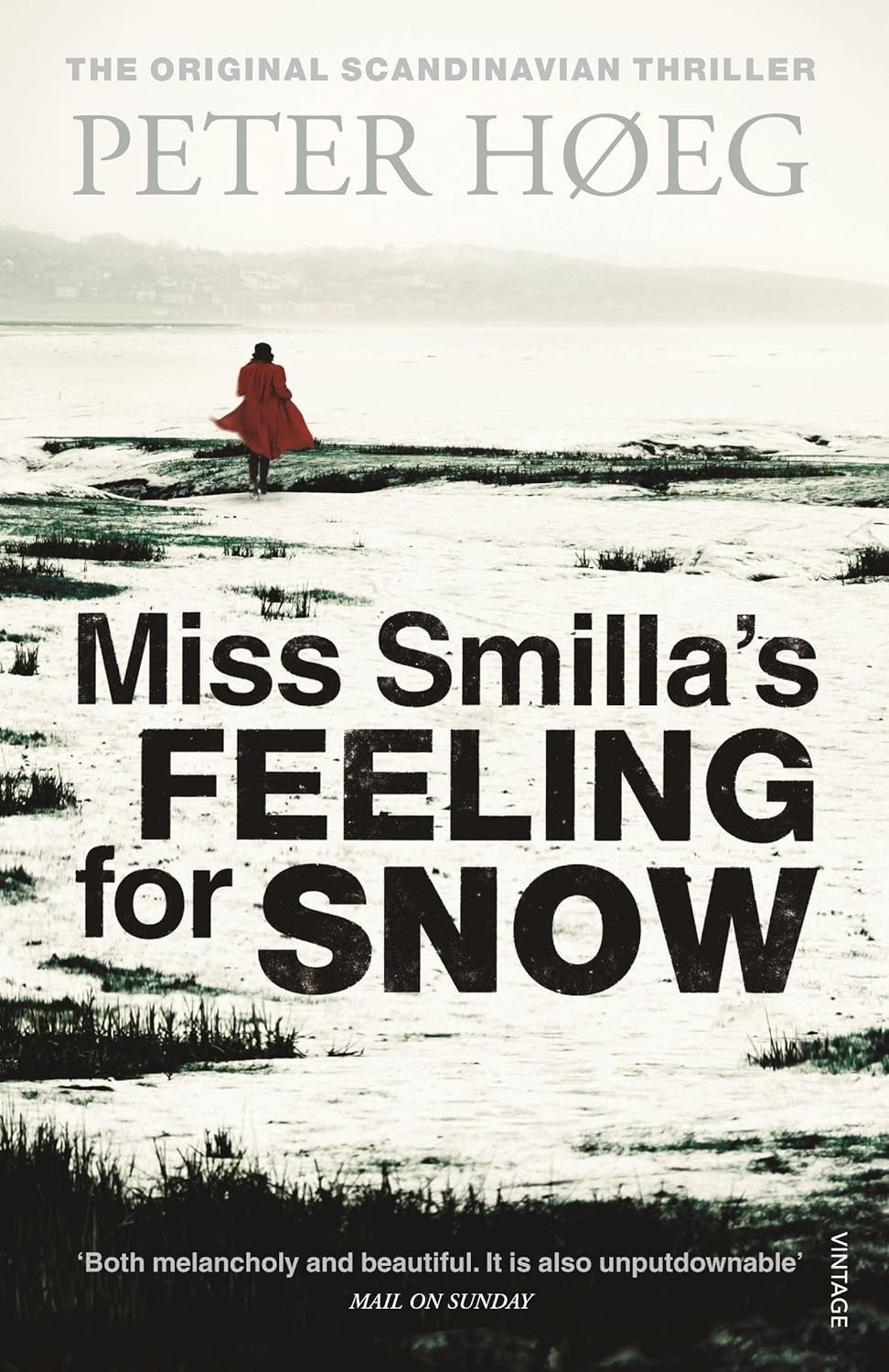 Book cover of 'Miss Smilla's Feeling for Snow' by Peter Hæg with a person walking on a snowy landscape. For customers across Bangladesh, Bookish Wonderland makes it easier to discover reader-friendly printed books through convenient delivery across Bangladesh and comfortable cream paper and clear printing.