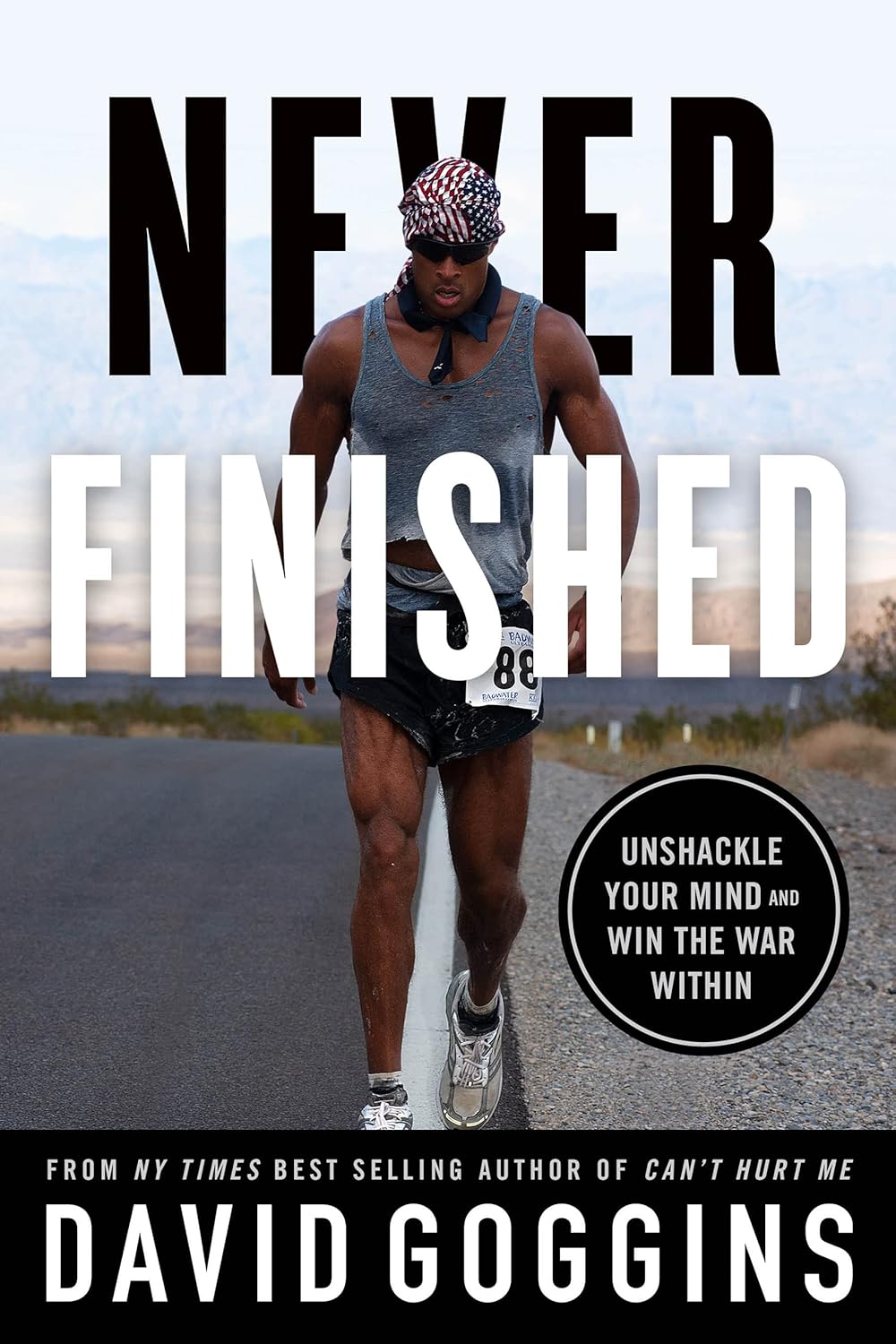 Book cover of 'Never Finished' by David Goggins featuring a runner on a road. Customers seeking quality English books across Bangladesh can purchase them through Bookish Wonderland, supported by nationwide delivery and sharp text and durable binding.