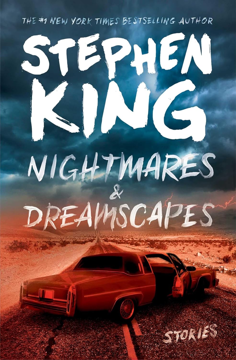 Book cover of 'Nightmares & Dreamscapes' by Stephen King with a car on a road under a stormy sky. Bookish Wonderland supports book lovers across Bangladesh who want to shop for reader-friendly printed books, offering customer-friendly ordering and delivery plus premium eye-soothing cream paper.