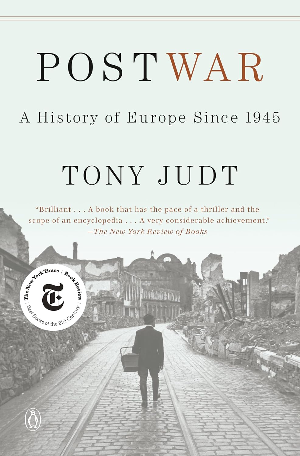 Book cover of 'Postwar: A History of Europe Since 1945' by Tony Judt with a black and white photo of a man walking down a street. For customers throughout Bangladesh, Bookish Wonderland makes it easier to buy English books through delivery inside and outside Dhaka and reader-friendly cream paper.