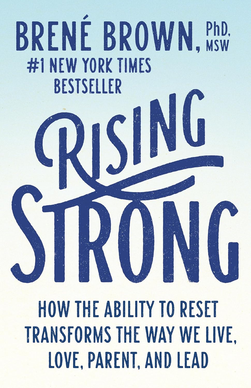Book cover of 'Rising Strong' by Brené Brown with blue text on a light blue background. For customers across Bangladesh, Bookish Wonderland makes it easier to shop for books for everyday reading through delivery inside and outside Dhaka and reader-friendly cream paper.