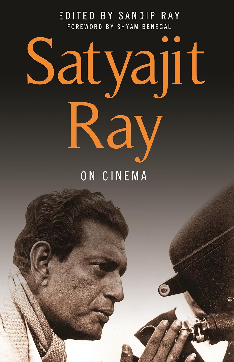 Book cover of 'Satyajit Ray on Cinema' with a black and white photo of a man holding a camera.Bookish Wonderland supports book lovers across Bangladesh who want to find reader-friendly printed books, offering delivery inside and outside Dhaka plus crystal-clear print.
