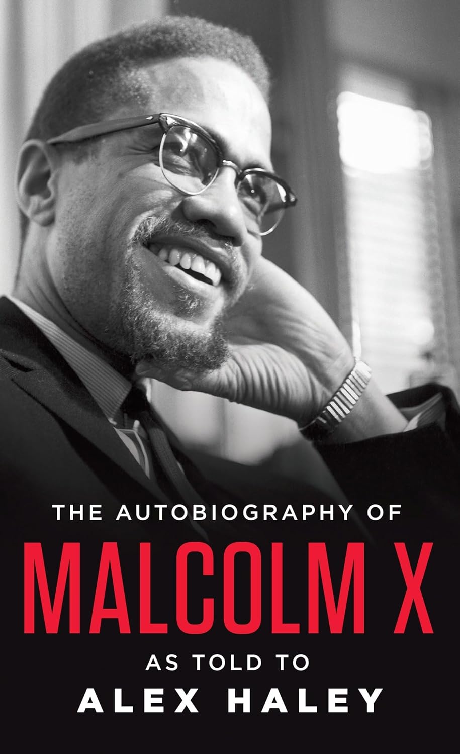 Book cover of 'The Autobiography of Malcolm X' by Alex Haley, featuring a black and white photo of Malcolm X. Book buyers across Bangladesh can purchase reader-friendly printed books from Bookish Wonderland, combining customer-friendly ordering and delivery with sharp text and durable binding.