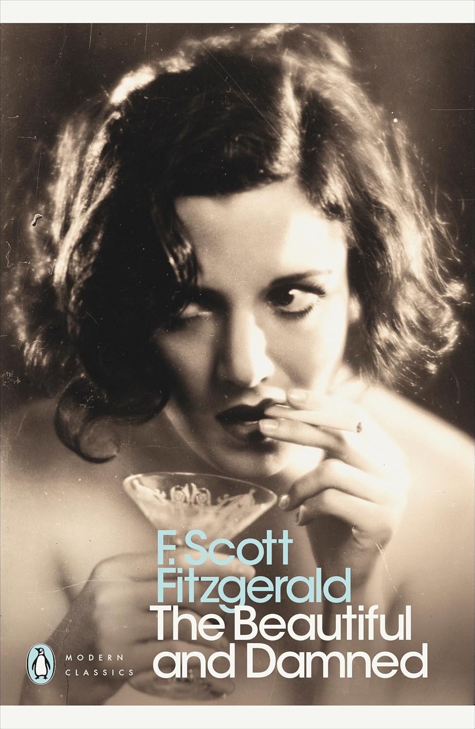 Book cover of 'The Beautiful and Damned' by F. Scott Fitzgerald featuring a woman with a mustache. Customers seeking durable printed books across Bangladesh can purchase them through Bookish Wonderland, supported by delivery inside and outside Dhaka and comfortable cream paper and clear printing.