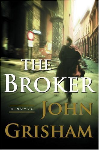Book cover of 'The Broker' by John Grisham with a blurred image of two people walking down a street. Book buyers across Bangladesh can choose durable printed books from Bookish Wonderland, combining Cash on Delivery across Bangladesh with reader-friendly cream paper.