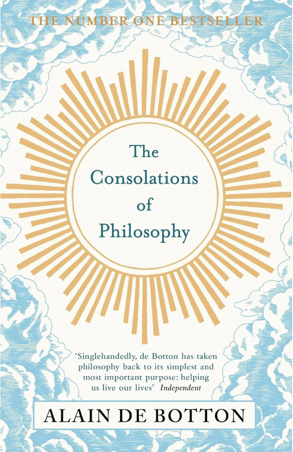 Book cover of 'The Consolations of Philosophy' by Alain de Botton with a sun-like design on a light blue background.For online book buying throughout Bangladesh, Bookish Wonderland lets readers order English books with delivery inside and outside Dhaka and attention to comfortable cream paper and clear printing.