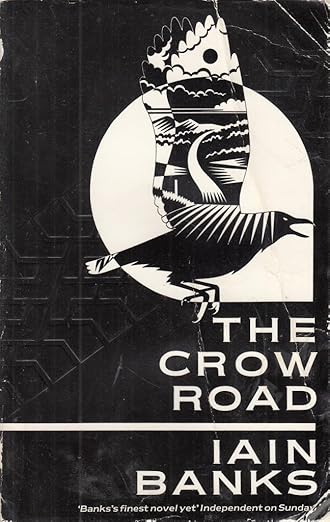 Book cover of 'The Crow Road' by Iain Banks with a stylized bird design on a black background. For customers across Bangladesh, Bookish Wonderland makes it easier to find printed English books through delivery inside and outside Dhaka and crystal-clear print.