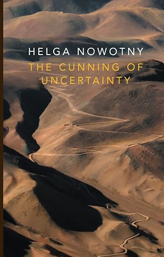 Book cover of 'The Cunning of Uncertainty' by Helga Nowotny with a desert landscape. For customers across Bangladesh, Bookish Wonderland makes it easier to discover English books through customer-friendly ordering and delivery and reader-friendly cream paper.