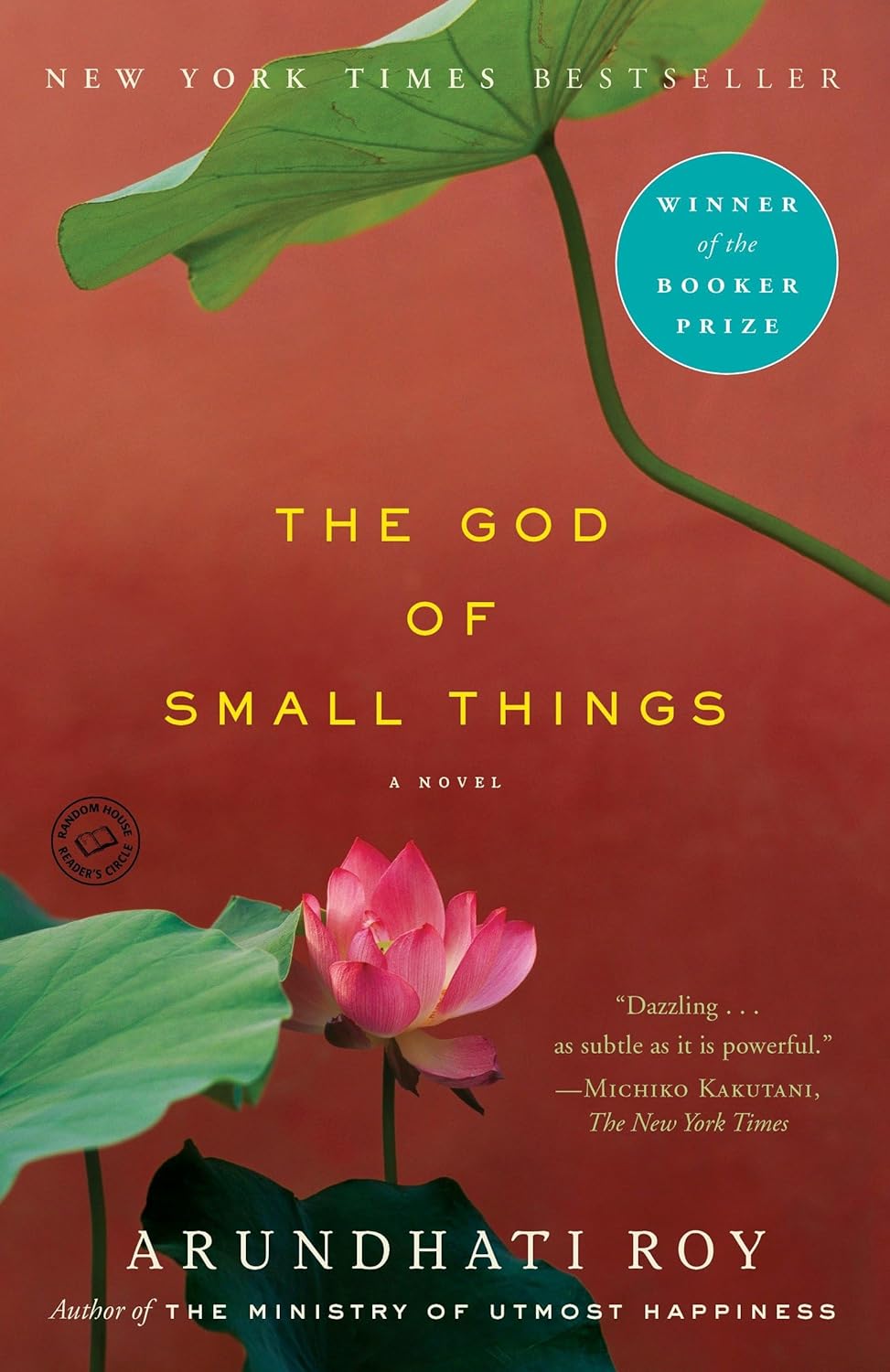 Book cover of 'The God of Small Things' with a pink flower and green leaves on a red background. Customers seeking premium-quality books throughout Bangladesh can shop for them through Bookish Wonderland, supported by convenient delivery across Bangladesh and sharp text and durable binding.