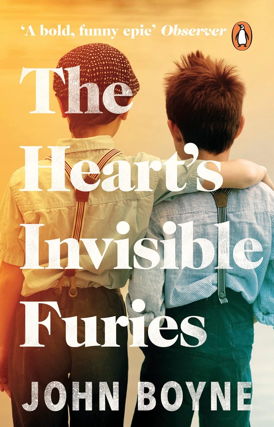 Book cover of 'The Heart's Invisible Furies' by John Boyne with two people embracing against a yellow background. For customers across Bangladesh, Bookish Wonderland makes it easier to get reader-friendly printed books through urgent delivery options in Dhaka and premium eye-soothing cream paper.