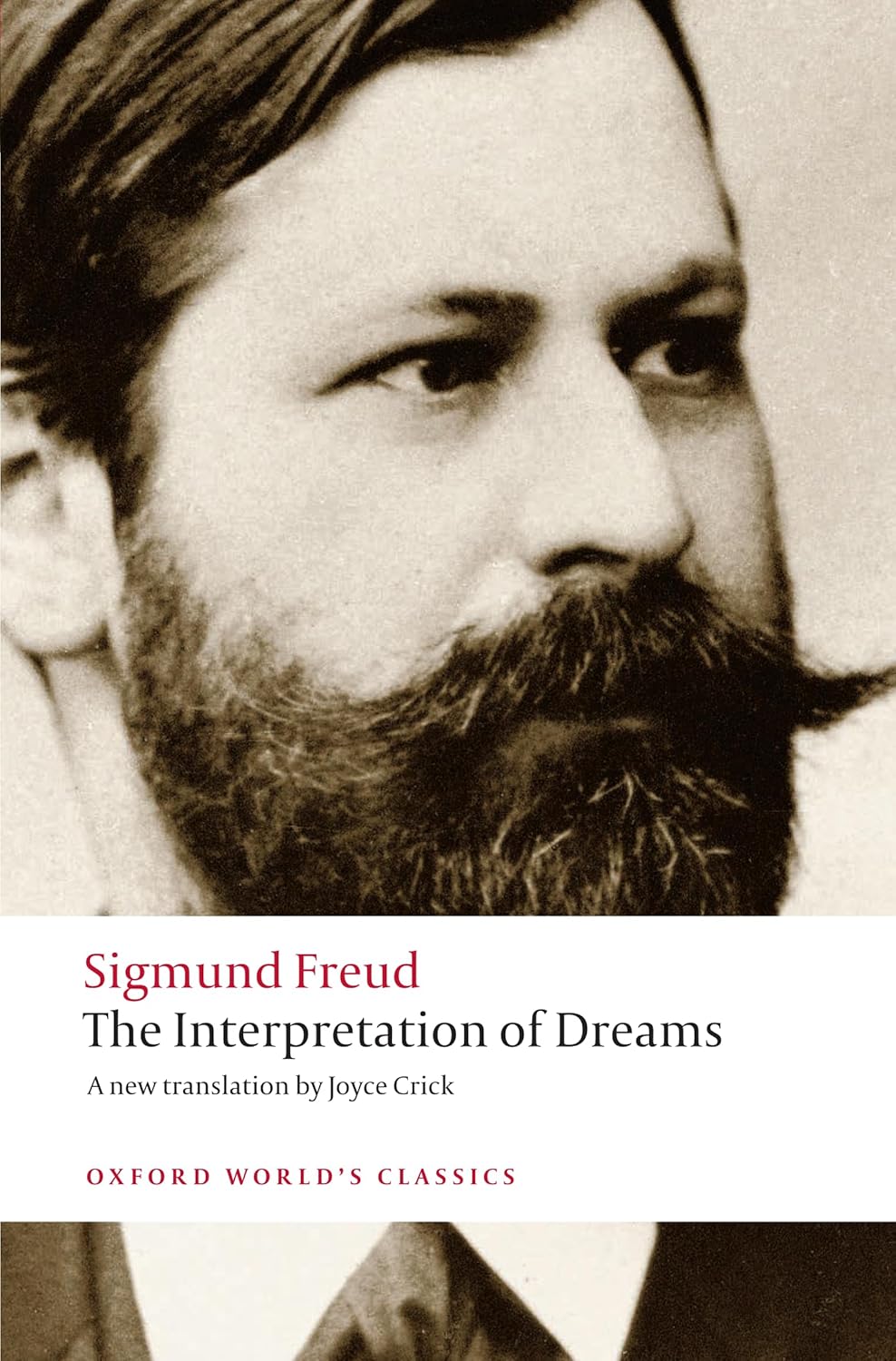 Book cover of 'The Interpretation of Dreams' by Sigmund Freud with a sepia-toned portrait of Freud.Customers seeking books for everyday reading throughout Bangladesh can shop for them through Bookish Wonderland, supported by fast delivery options in Dhaka and high-quality stitched and glue binding.