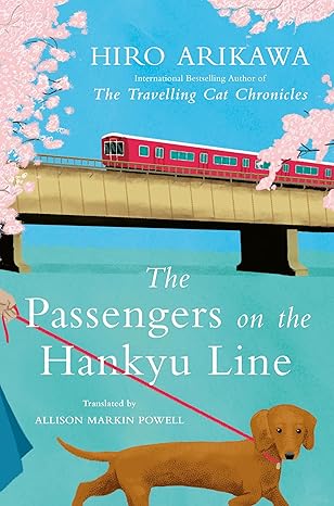 Book cover of 'The Passengers on the Hankyu Line' with a train and cherry blossoms on a blue background. Bookish Wonderland helps readers across Bangladesh choose books for study and leisure online with convenient delivery across Bangladesh and a focus on reader-friendly cream paper.