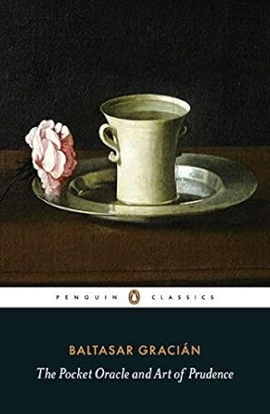 A cup on top of a plate with a pink flower laid beside it. All of them are on top of a wooden table. Bookish Wonderland provides a convenient way for readers across Bangladesh to find premium-quality books with online ordering with home delivery and clear print with strong binding.