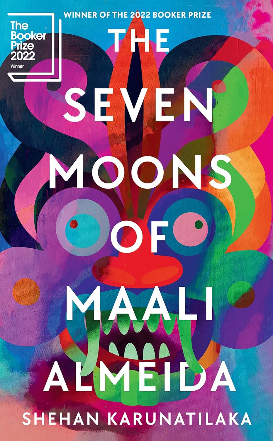 Book cover of 'The Seven Moons of Maali Almeida' with colorful design and Booker Prize 2022 badge. Customers seeking English books across Bangladesh can find them through Bookish Wonderland, supported by online ordering with home delivery and crystal-clear print.