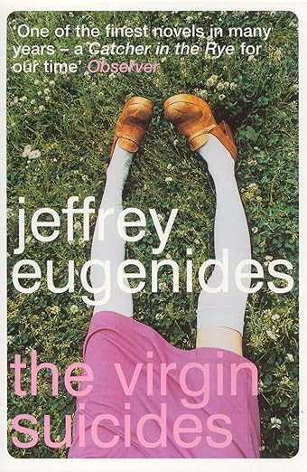 Book cover of 'The Virgin Suicides' by Jeffrey Eugenides with a person in white socks and brown shoes lying on grass. available at Bookish wonderland