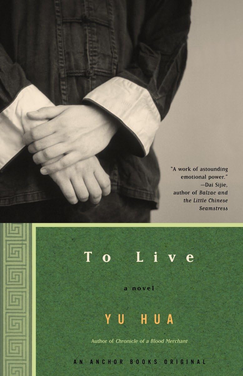 Book cover of 'To Live' by Yu Hua with a black and white photo of hands on a person wearing a jacket. Customers in Bangladesh can buy books in any language from Bookish Wonderland.