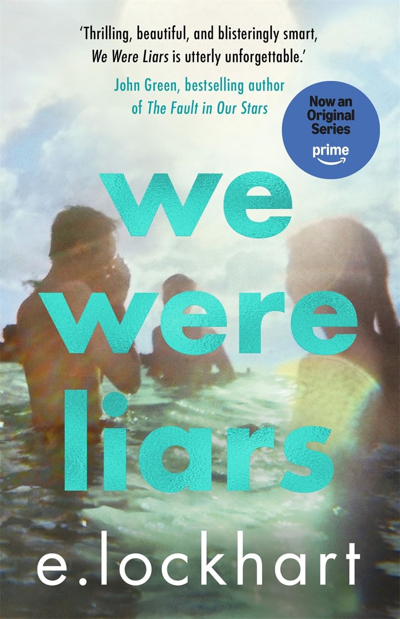 Book cover of 'We Were Liars' with a blurred background of people in water.