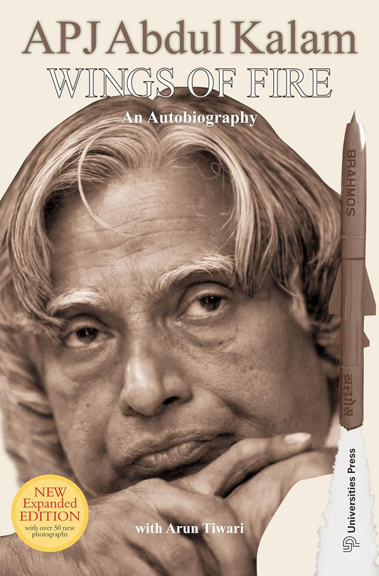 Book cover of 'Wings of Fire' by APJ Abdul Kalam with a portrait and a rocket model.