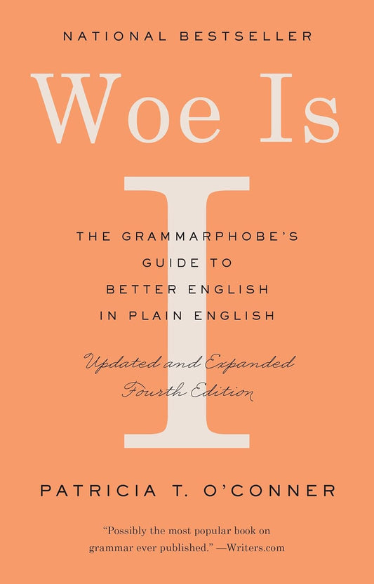 Book cover of 'Woe Is I' by Patricia T. O'Connor with an orange background and white text. Bookish Wonderland provides books for researchers in Bangladesh.