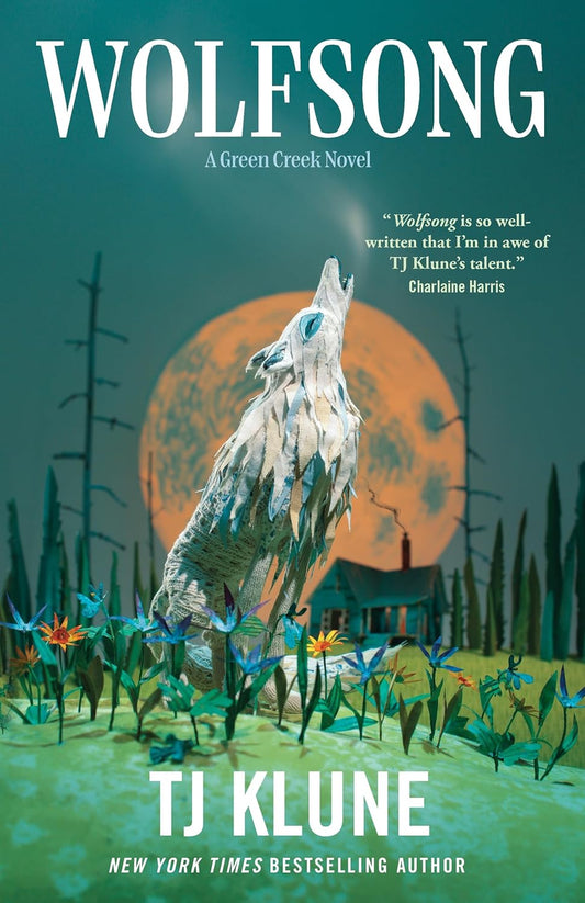 Cover of Wolfsong by T.J. Klune, a Green Creek novel, featuring a white howling wolf in a field of colorful wildflowers beneath a large full moon, with a small cabin and dark trees in the background against a teal night sky. Bookish Wonderland makes online book shopping convenient in Bangladesh.