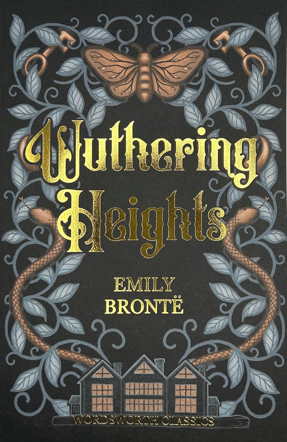 Front cover of the Wordsworth Classics edition of "Wuthering Heights" by Emily Brontë, featuring ornate gothic illustrations of vines, snakes, keys, a moth, and a manor house surrounding gold foil title lettering.