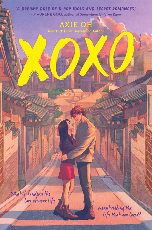 Front cover of the YA romance novel "XOXO" by Axie Oh, featuring an illustrated young couple embracing on a traditional Seoul street under a sunset sky, with the title written in large yellow brushstrokes. Bookish Wonderland focuses on customer satisfaction in Bangladesh.